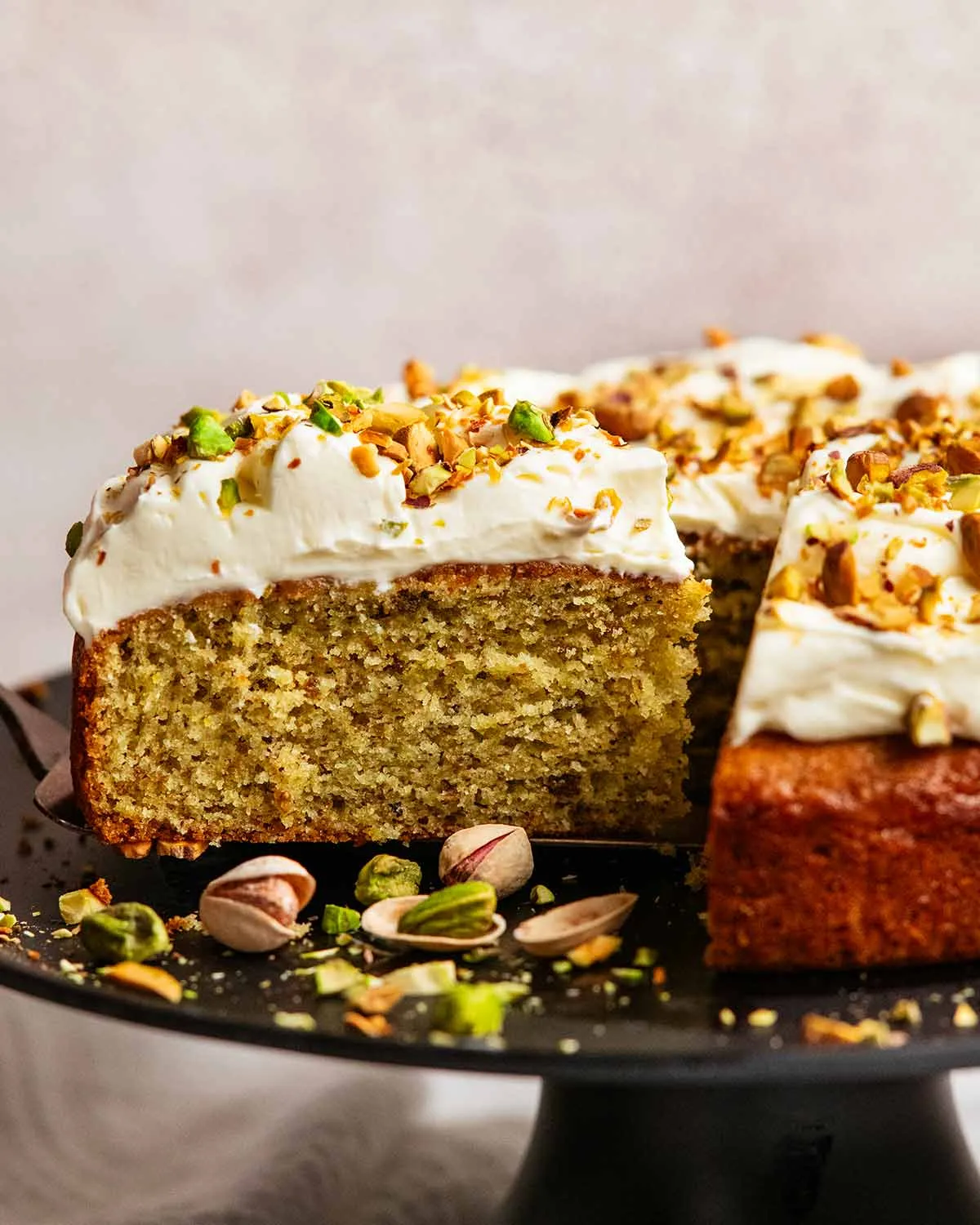 Beautifully decorated three tier pistachio layer cake